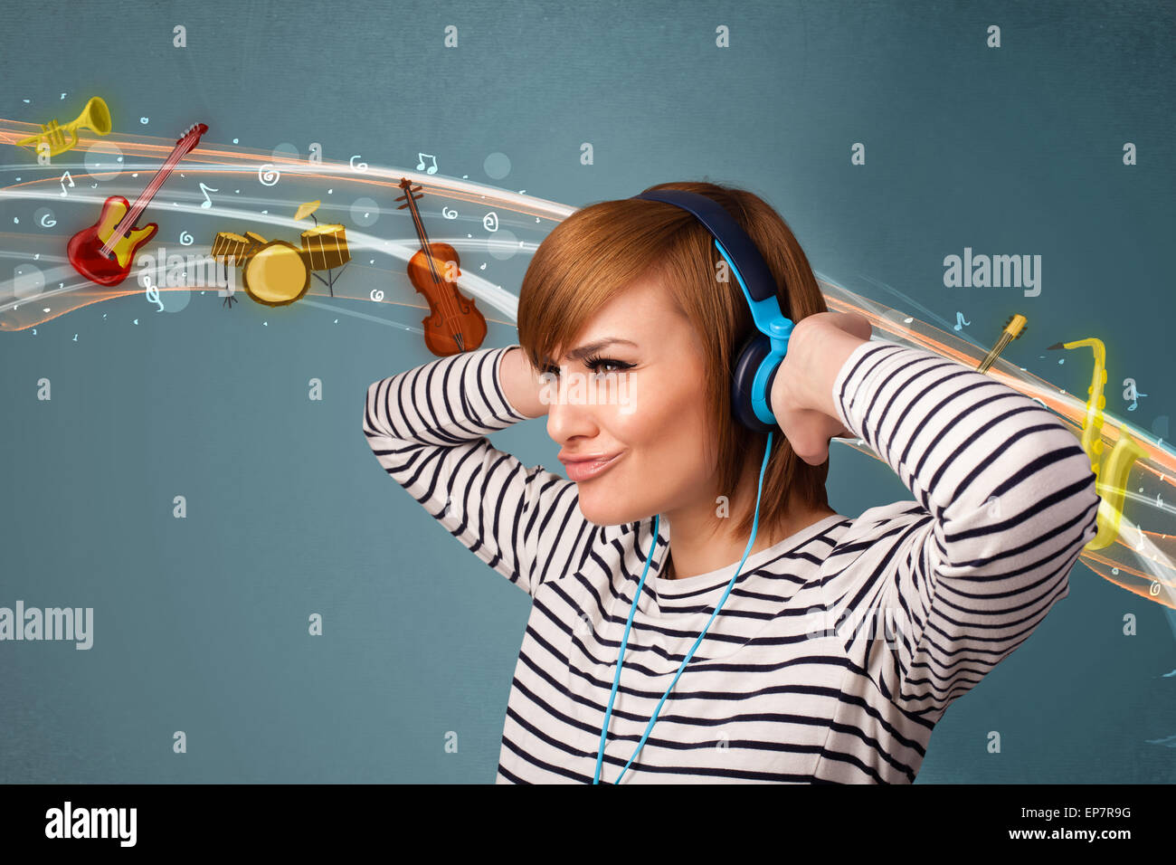 Young woman with headphones listening to music Stock Photo - Alamy