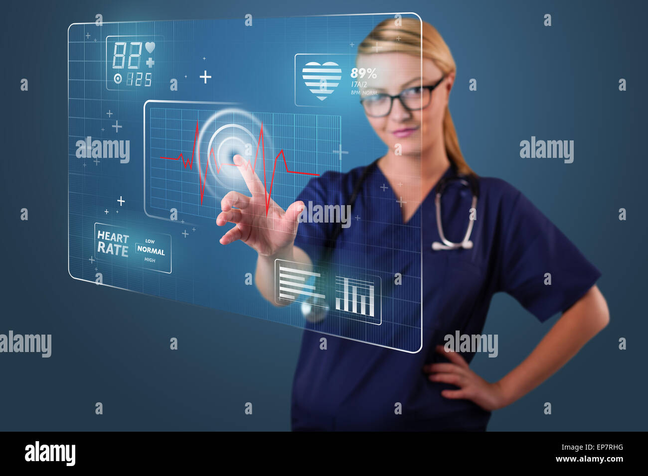 Young nurse pressing modern medical type of buttons Stock Photo - Alamy