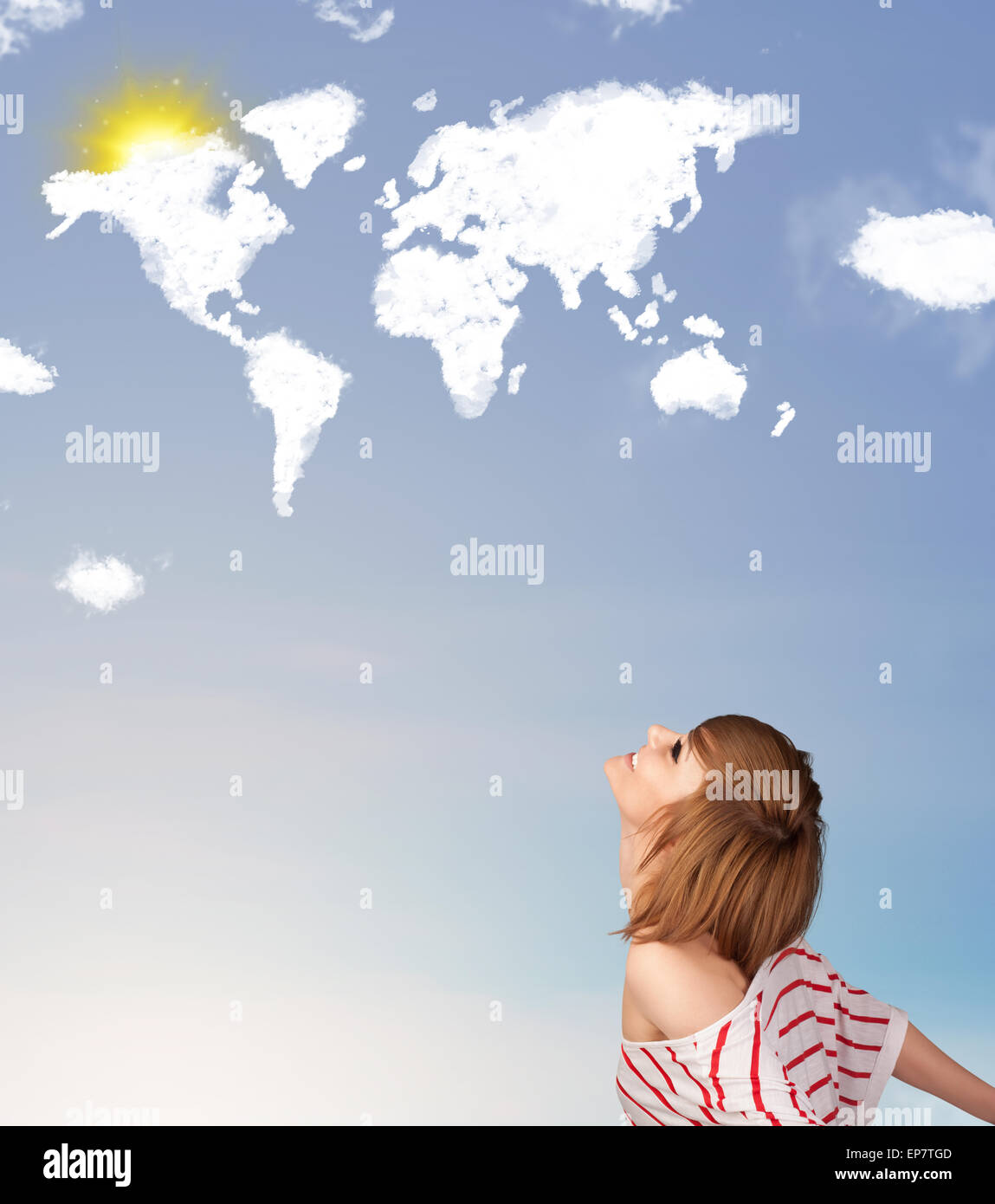 Young girl looking at world clouds and sun on blue sky Stock Photo - Alamy