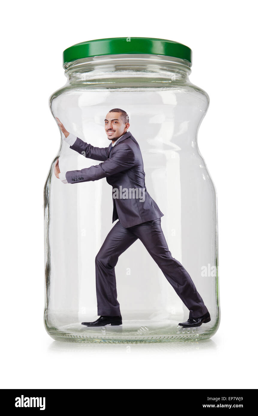 Young businessman in glass jar Stock Photo
