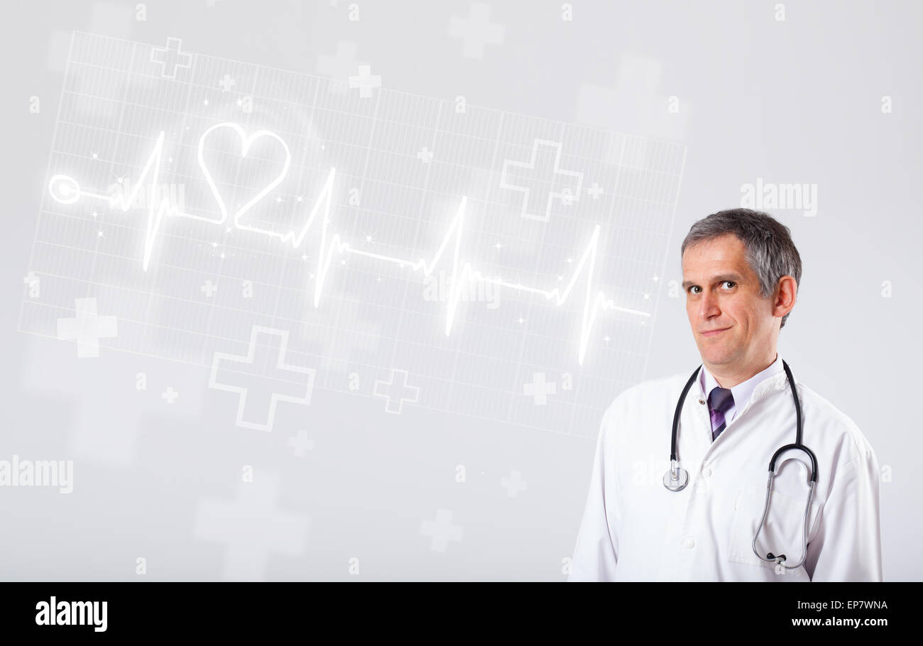 Doctor examinates heartbeat with abstract heart Stock Photo