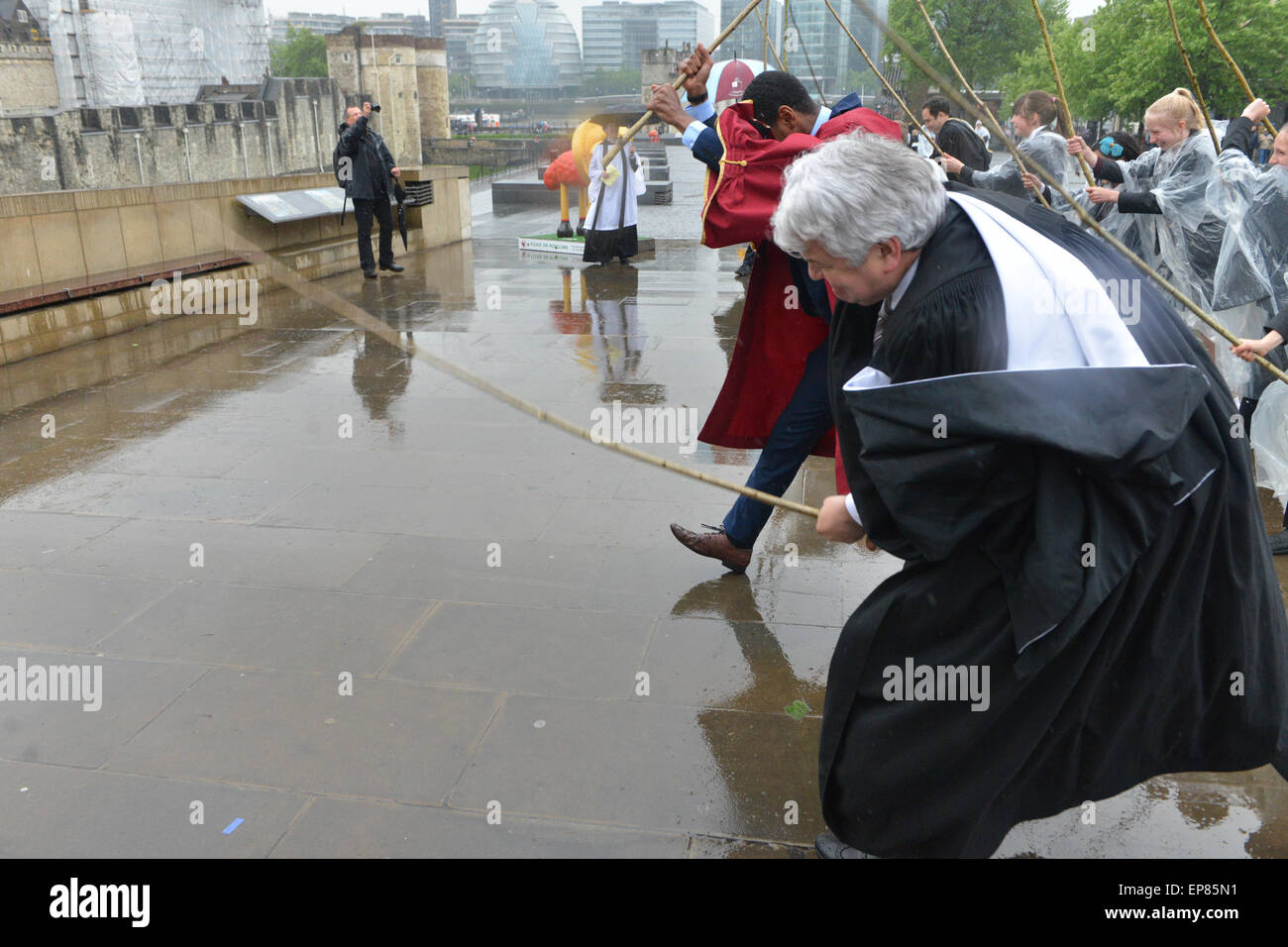 All Hallows Church, London, UK. 14th May 2015. A part of the boundary is outside The Tower of London. Beating the Bounds, an ancient custom when parishes establish their boundaries on Ascension Day by beating the ground with sticks at certain points. This is at All Hallows Church by The Tower, next to The Tower of London. Students from St Dunstan's College take part in the procession and beating of the bounds. Credit:  Matthew Chattle/Alamy Live News Stock Photo