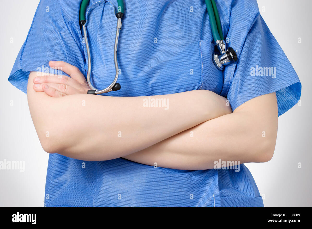Closeup of confident female doctor crossing her arms Stock Photo
