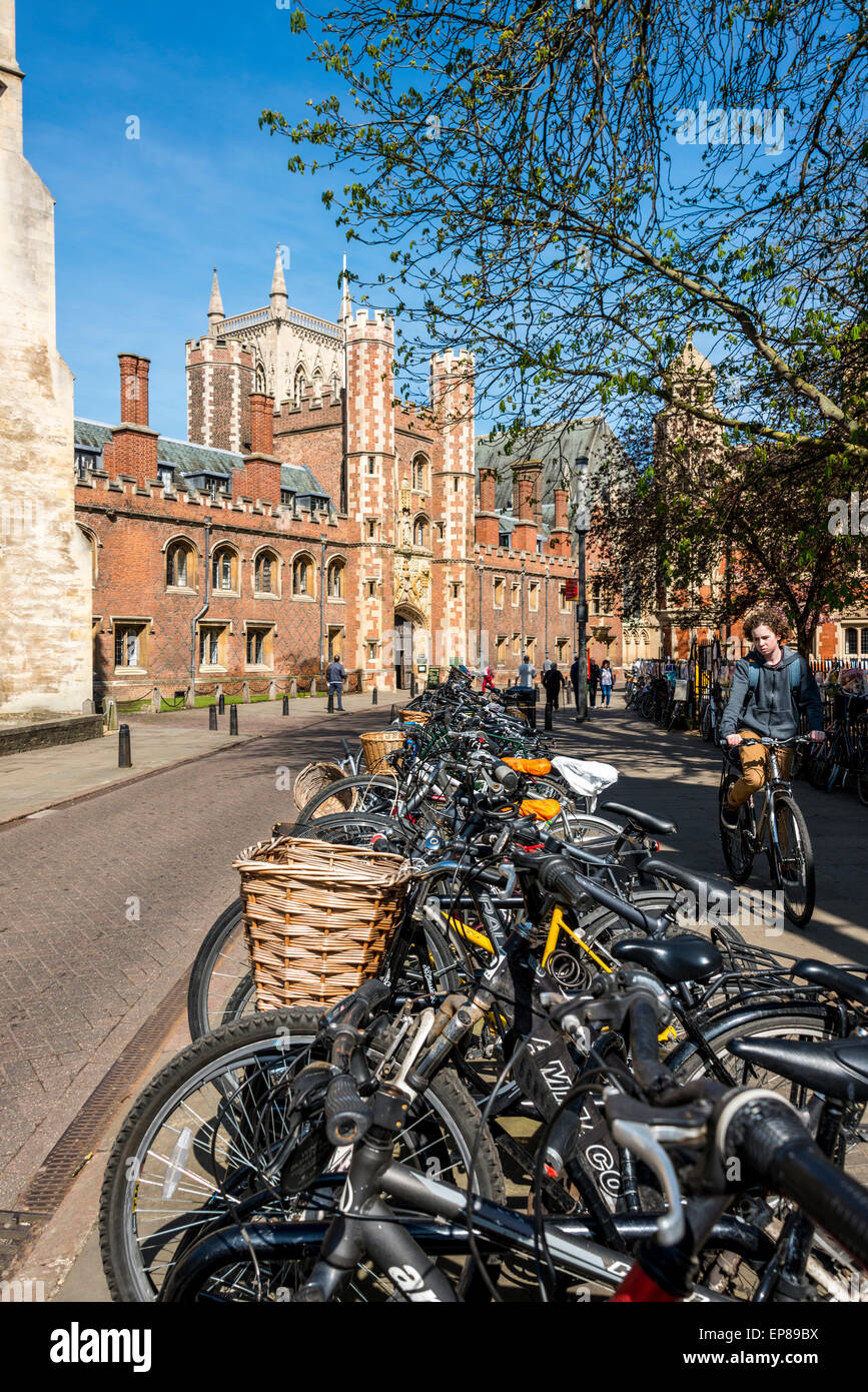 Bicycles parked on St Johns Street with St John's College of Cambridge University behind Stock Photo
