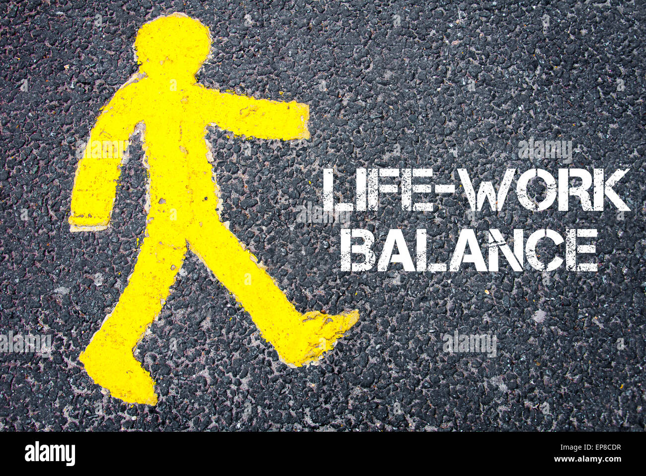Yellow pedestrian figure on the road walking towards LIFE WORK BALANCE ...