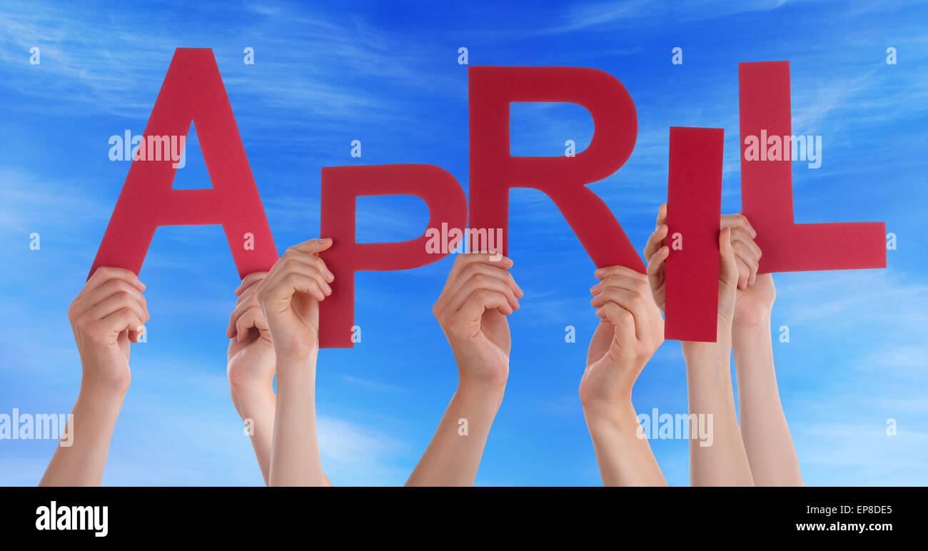 Many People Hands Holding Red Word April Blue Sky Stock Photo - Alamy