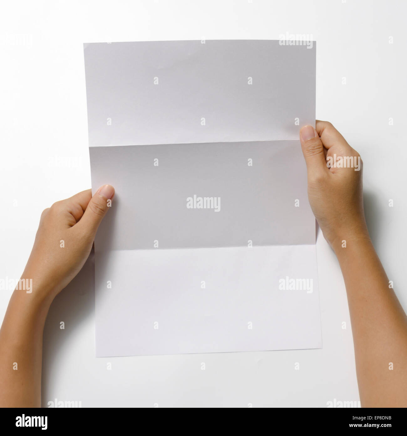 woman two hands holding blank paper a4 size on a white background Stock ...