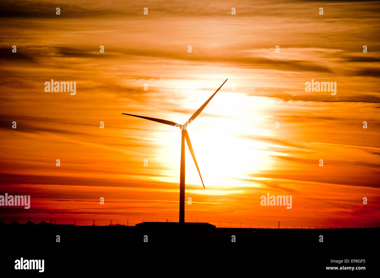 Wind turbine at sunset in SW Idaho Stock Photo