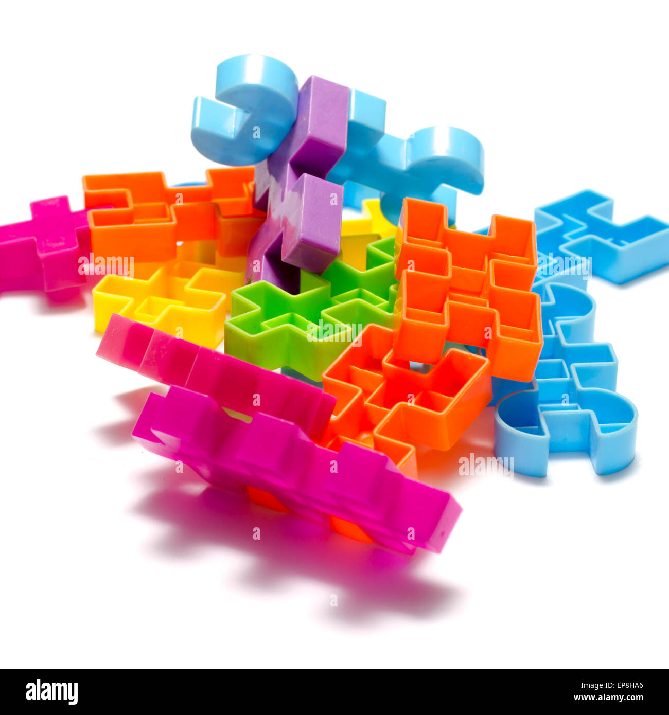 toy plastic blocks on a white background Stock Photo - Alamy