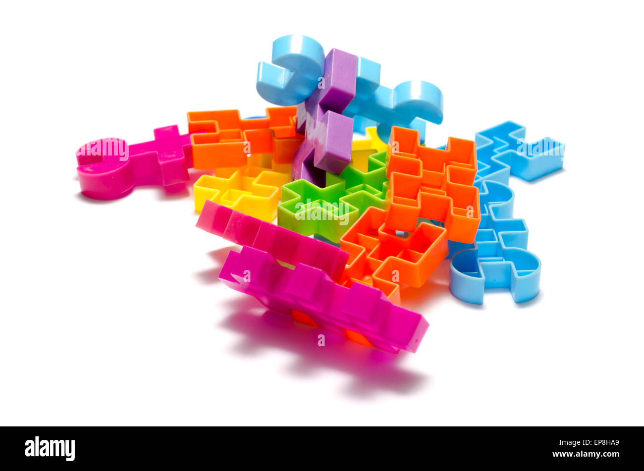 toy plastic blocks on a white background Stock Photo - Alamy