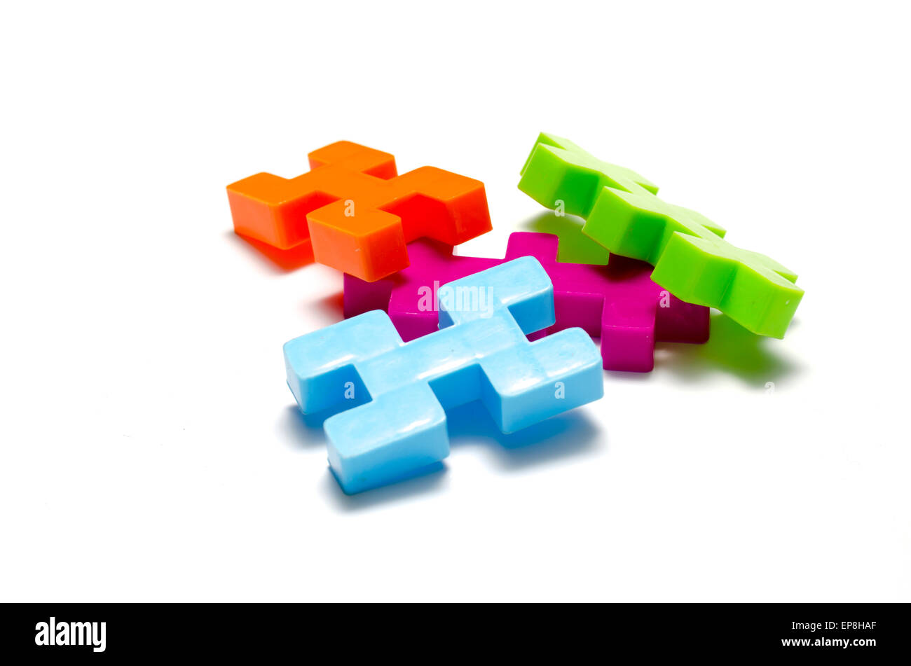 toy plastic blocks on a white background Stock Photo - Alamy