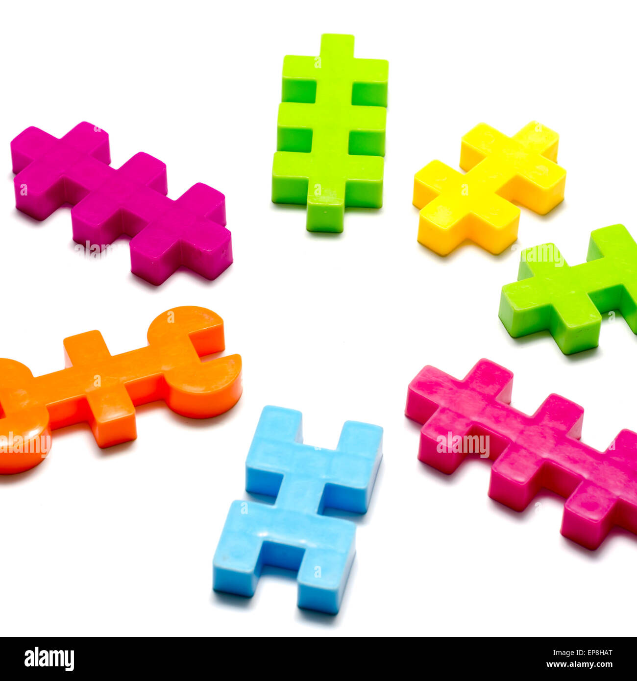 toy plastic blocks on a white background Stock Photo - Alamy