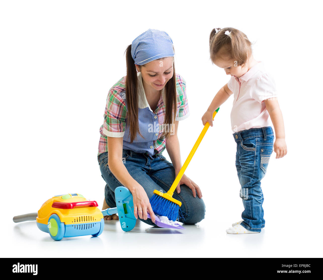 Child girl and mom cleaning room Stock Photo