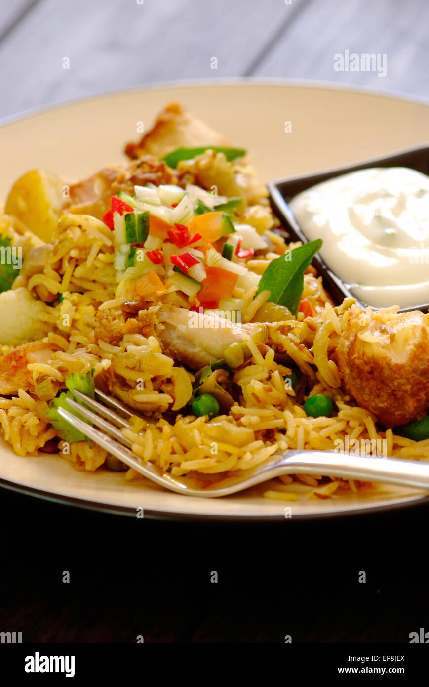 Chicken and Vegetable biryani are curry dishes introduced by the Indian population of South Africa who were brought over to work in the sugar cane fields of natal Stock Photo