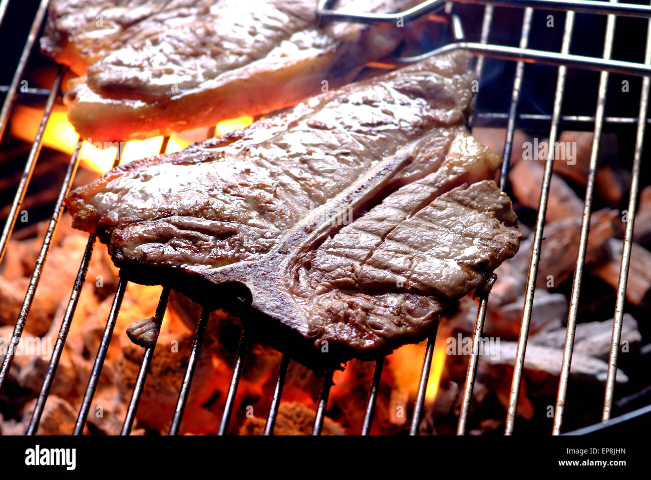 T bone steak on a South African braai Stock Photo Alamy