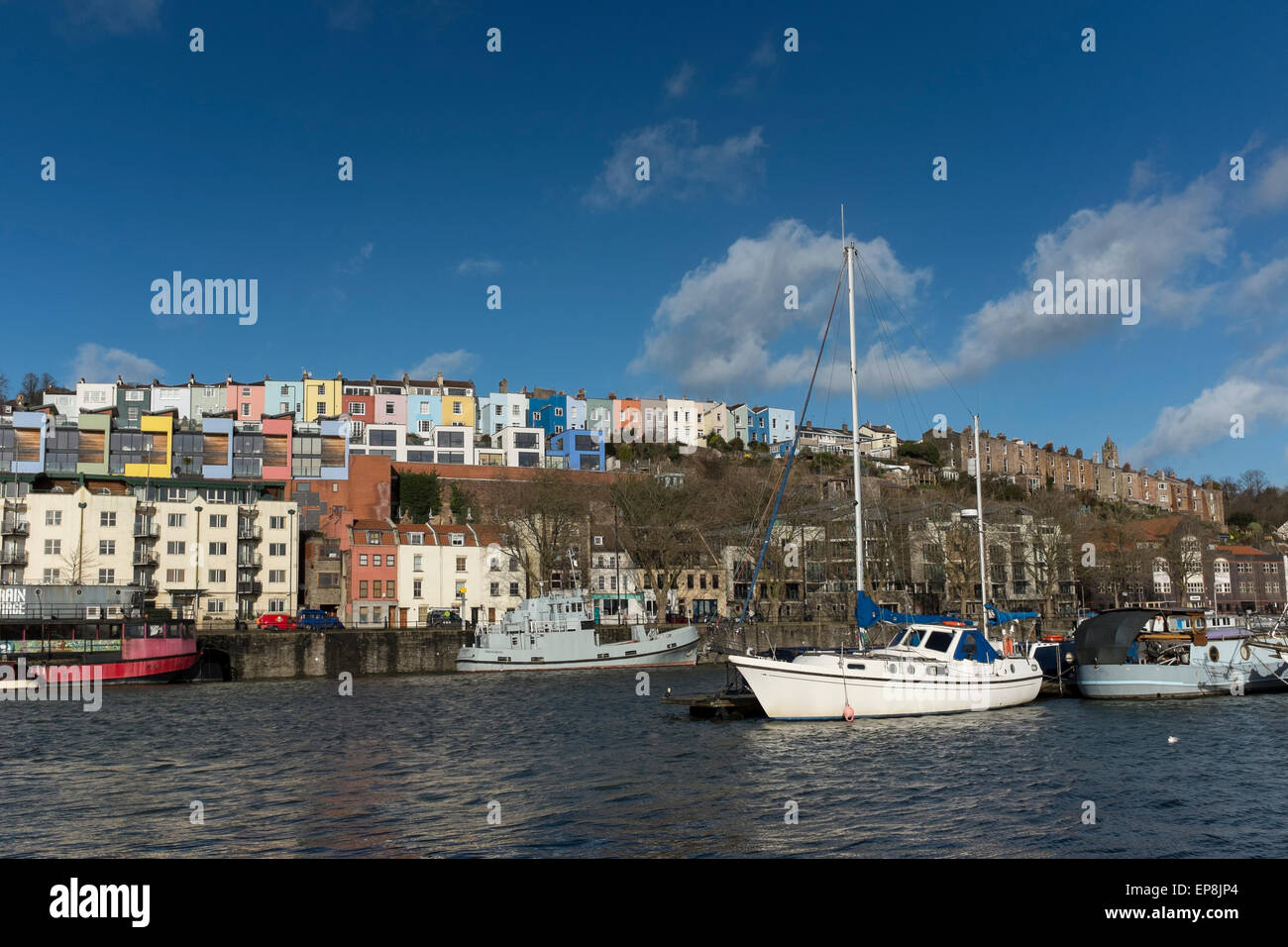 View of colourful terraced houses from Baltic Wharf Marina across Floating Harbour, Bristol, UK