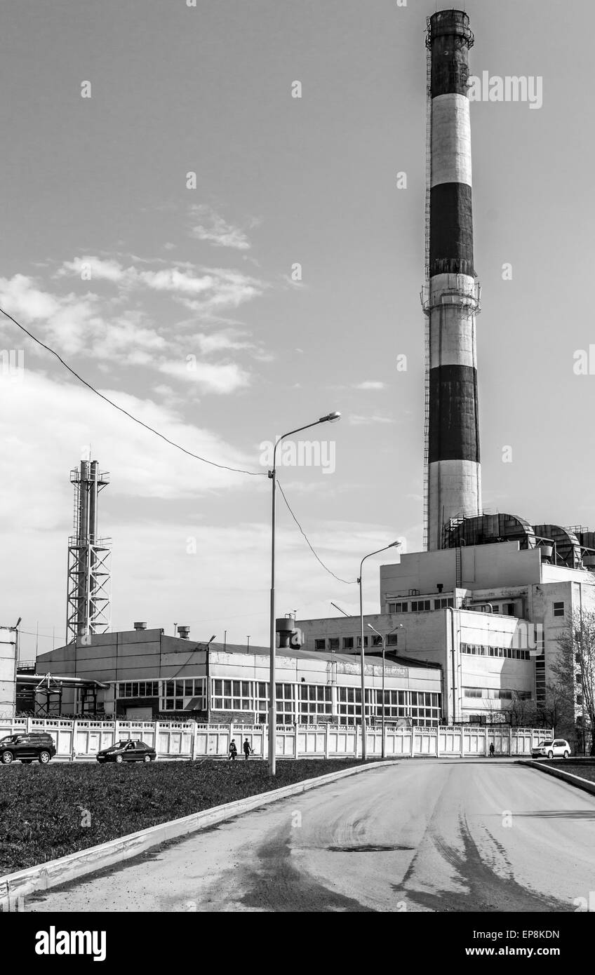 Work building with a large chimney in black and white Stock Photo