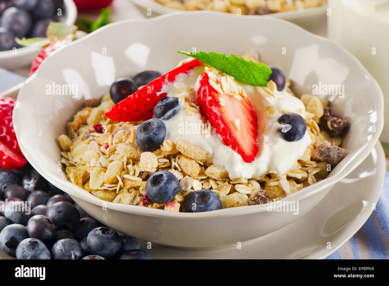 Healthy Breakfast with  berries, yogurt , muesli. Selective focus Stock Photo