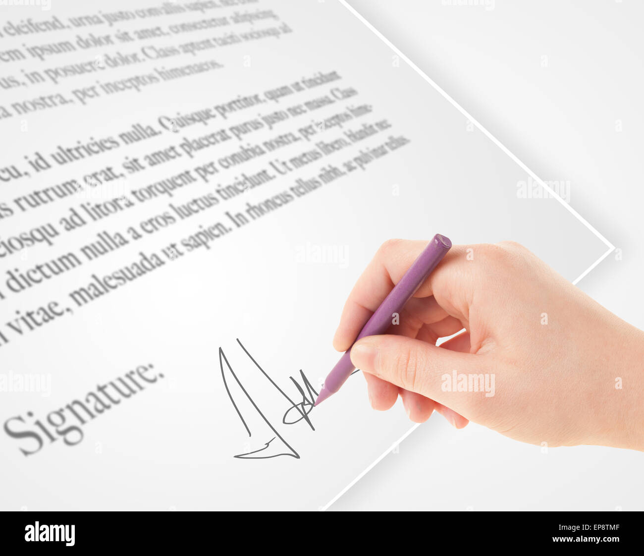 Hand writing personal signature on a paper form Stock Photo - Alamy