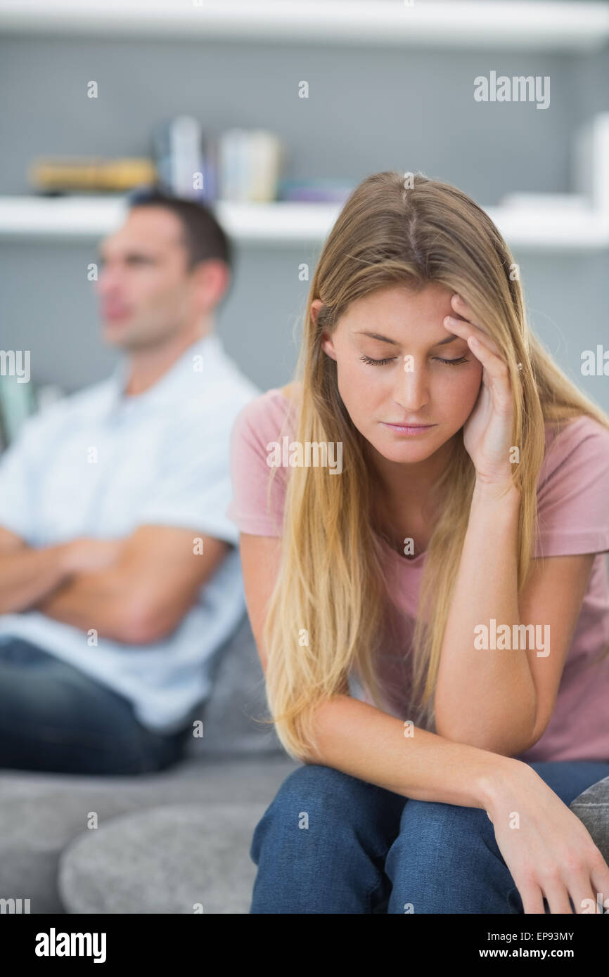 Couple not speaking after a fight on the couch Stock Photo - Alamy