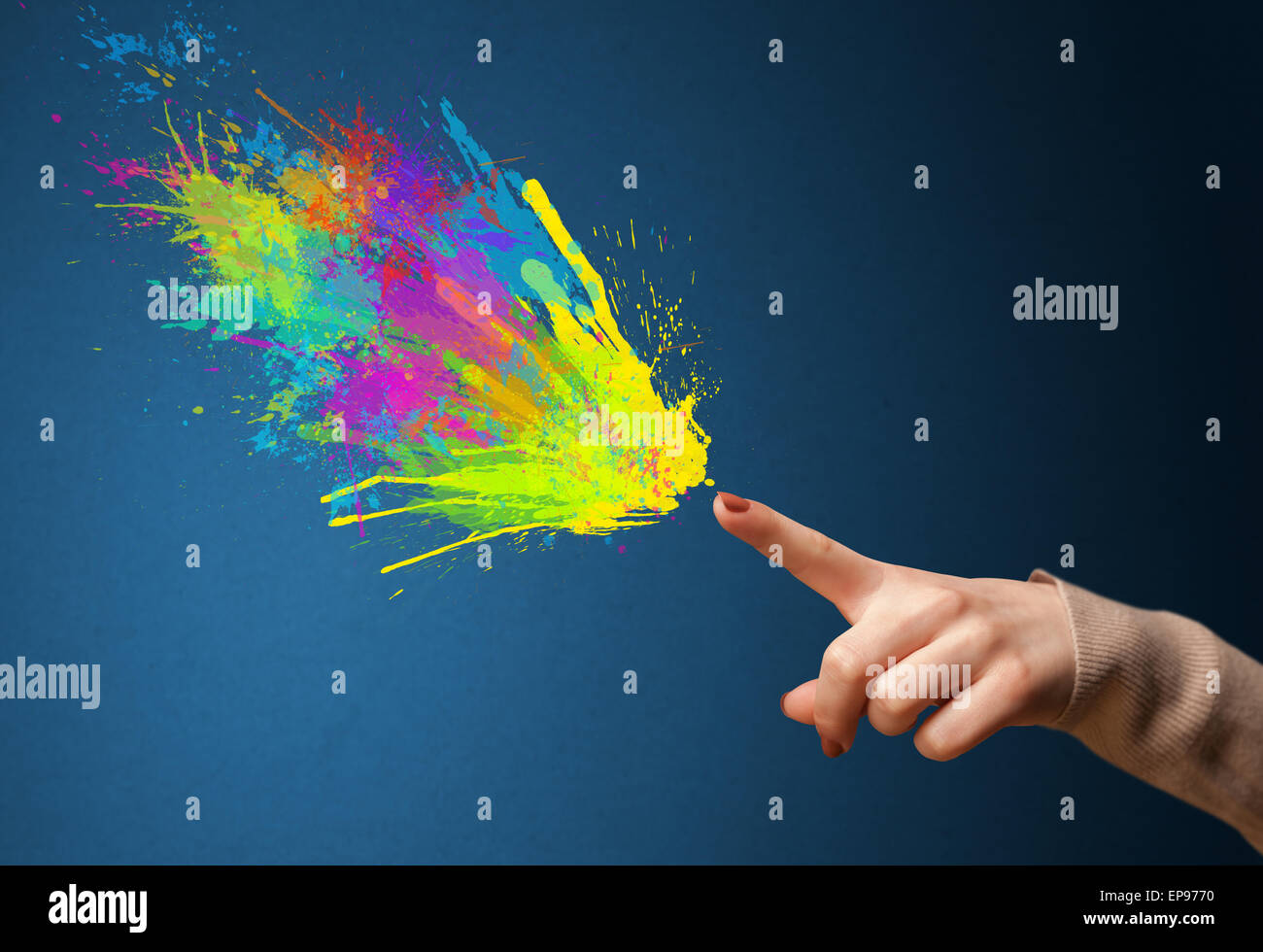 Colorful splashes are coming out of gun shaped hands Stock Photo - Alamy