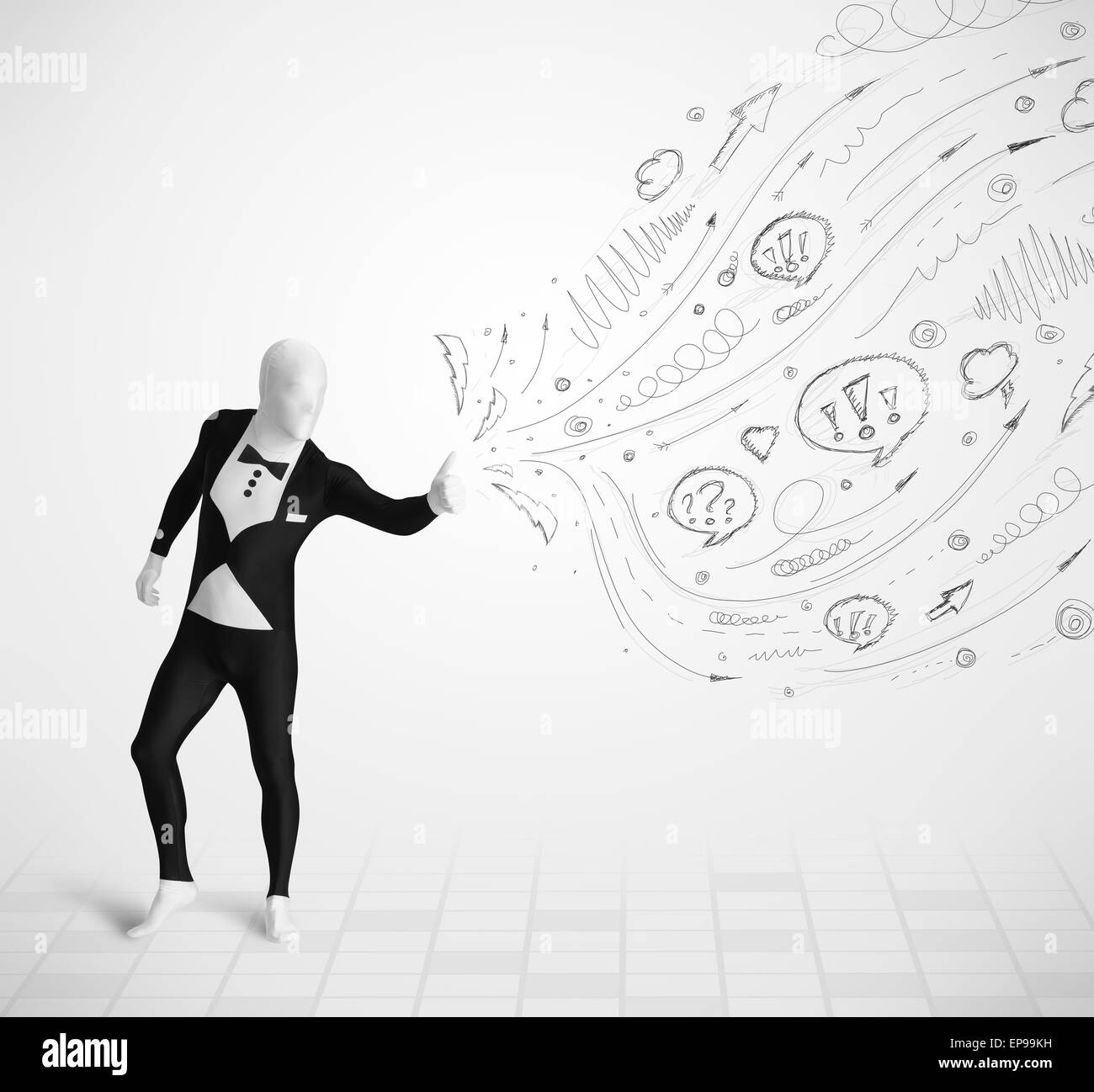 Guy in body suit morphsuit looking at sketches and doodles Stock Photo