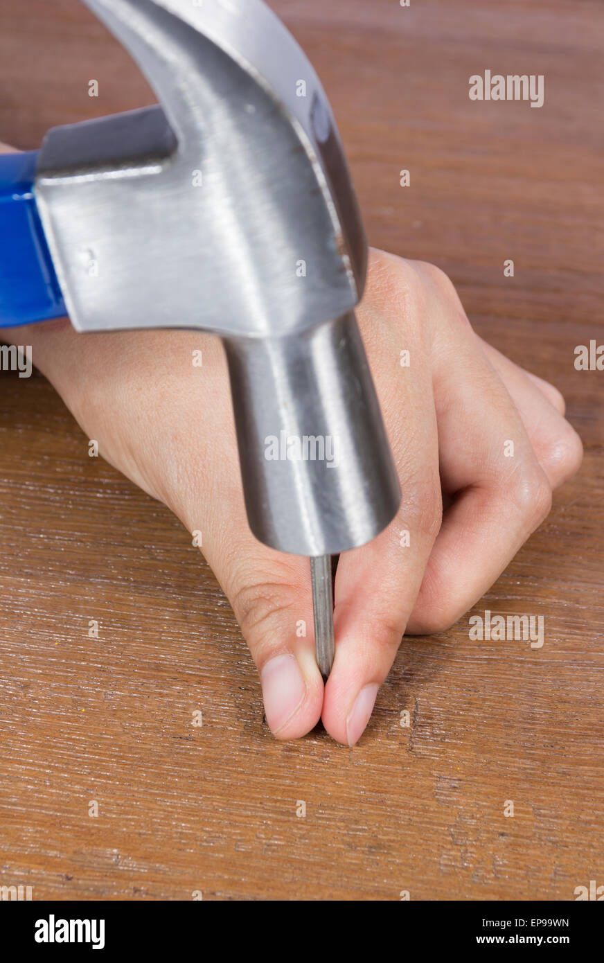 Hammer in hand Stock Photo Alamy