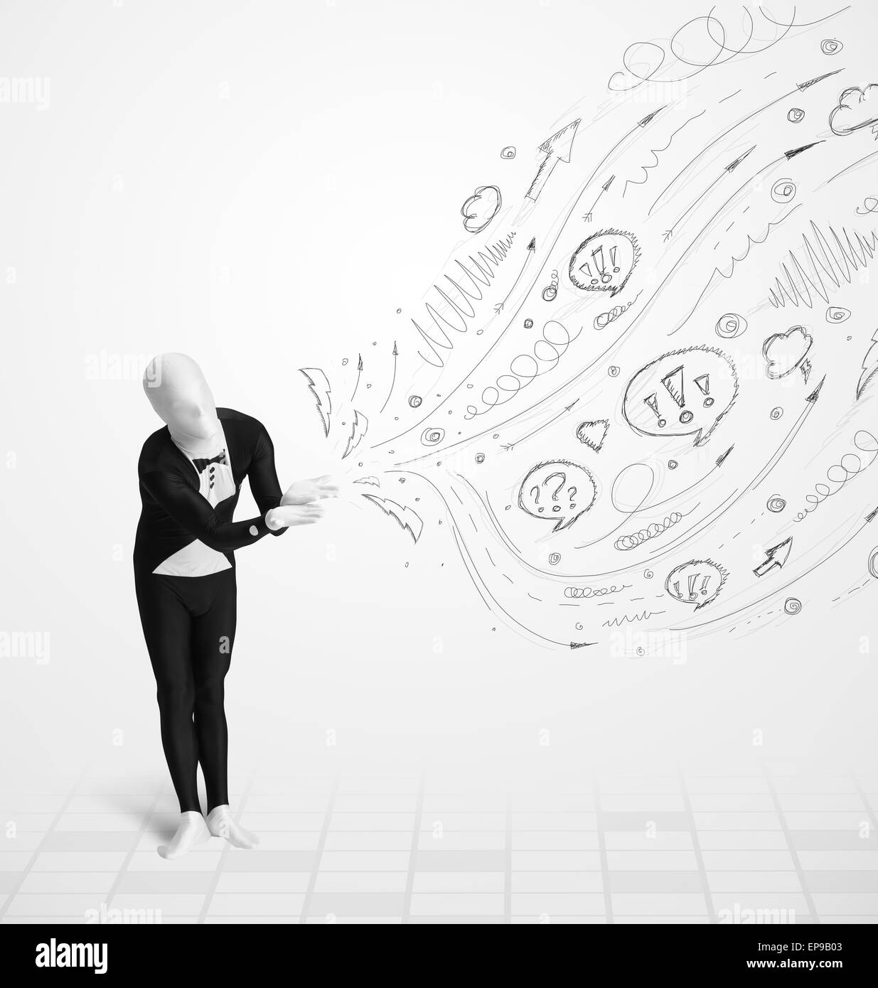 Guy in body suit morphsuit looking at sketches and doodles Stock Photo