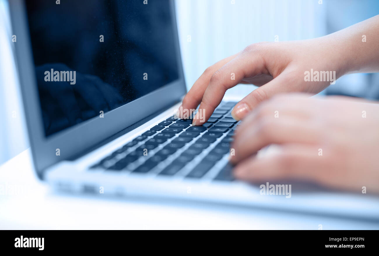 Close-up of typing hands Stock Photo - Alamy