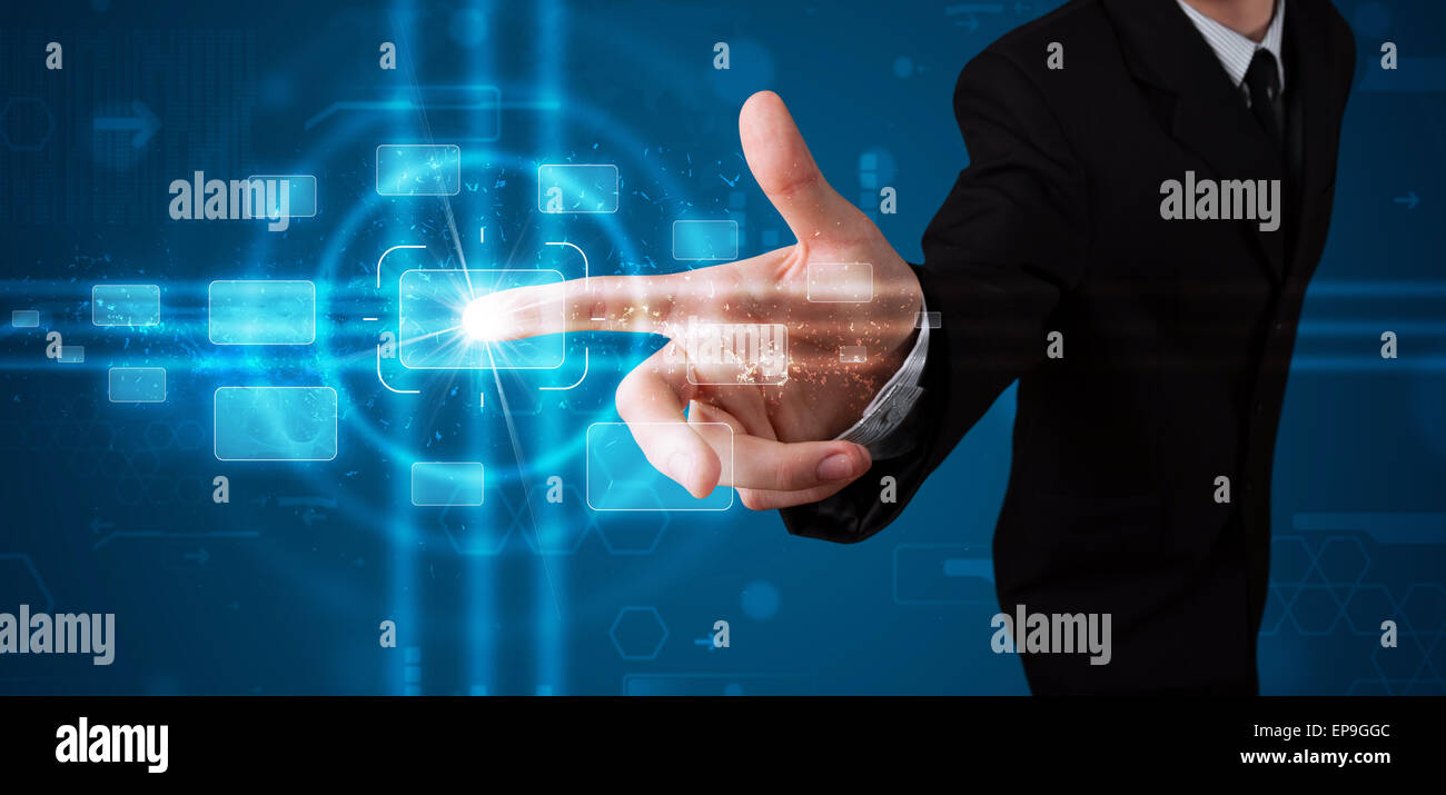 Businessman pressing high tech type of modern buttons Stock Photo - Alamy