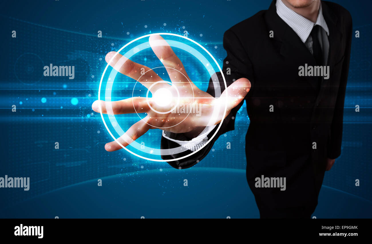 Businessman pressing high tech type of modern buttons Stock Photo - Alamy