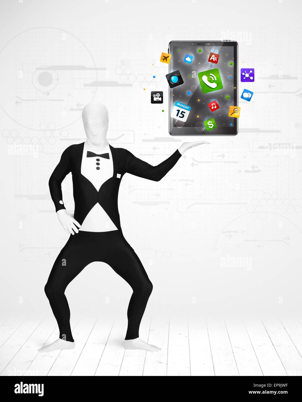 man in full body suit holdig tablet pc Stock Photo - Alamy