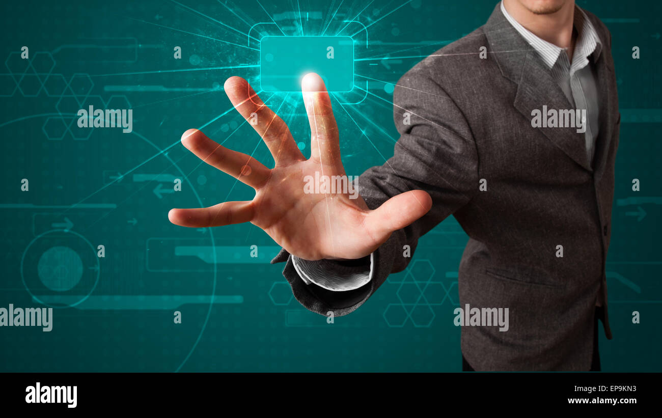 Businessman pressing high tech type of modern buttons Stock Photo - Alamy