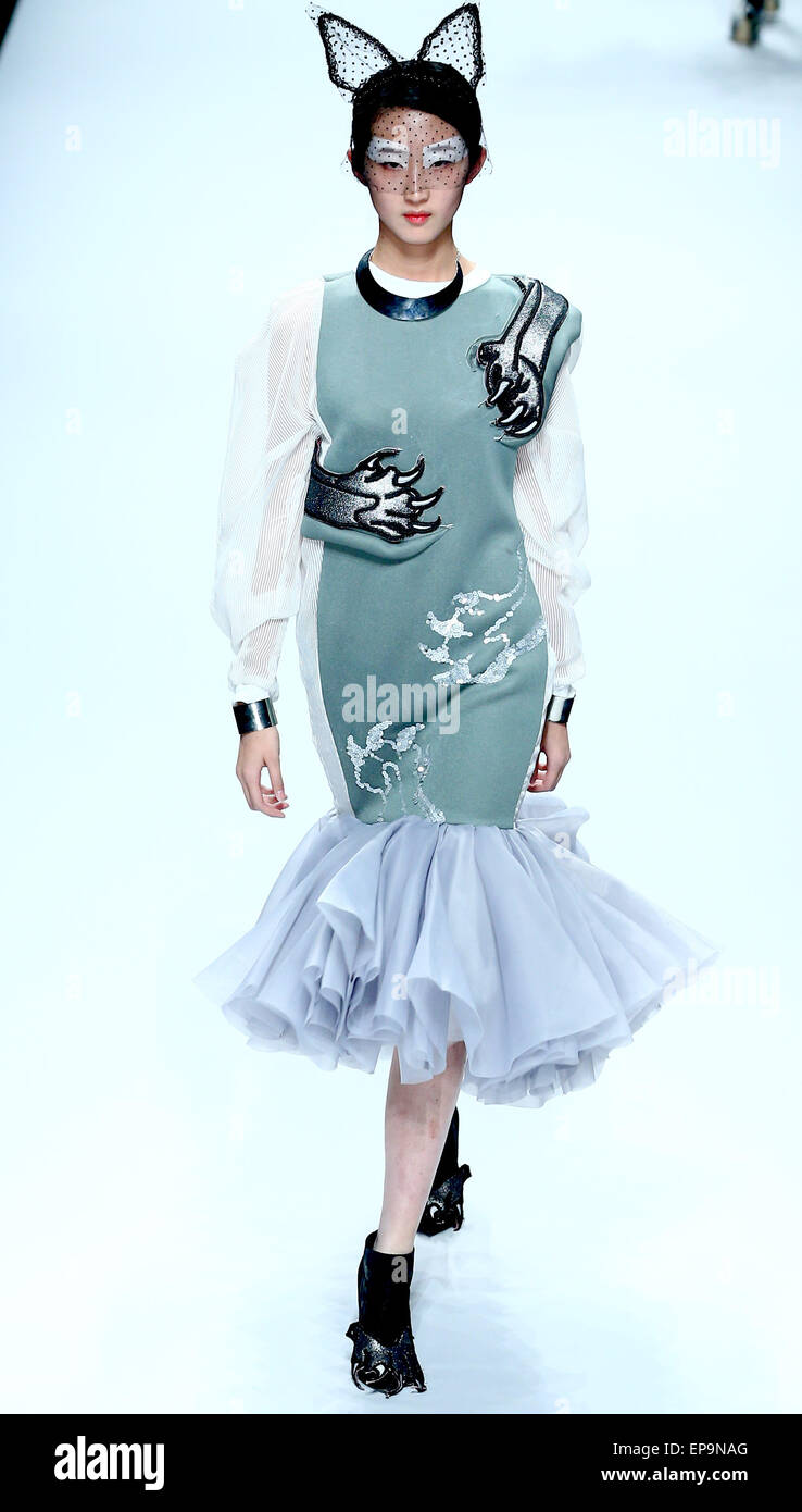 Beijing, China. 15th May, 2015. A model presents a creation designed by ...