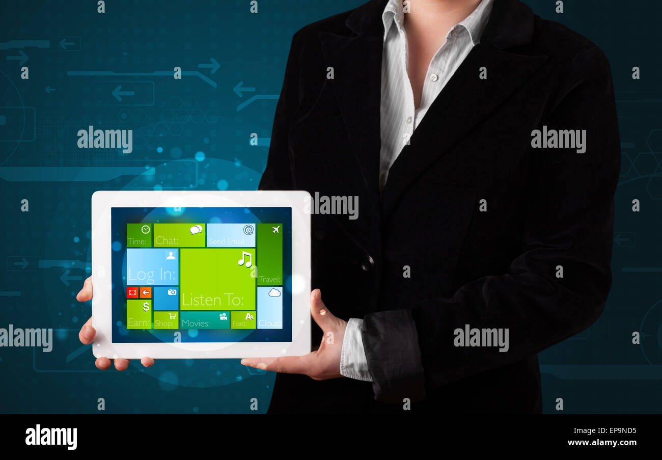 Lady holding tablet with modern software operational system Stock Photo ...
