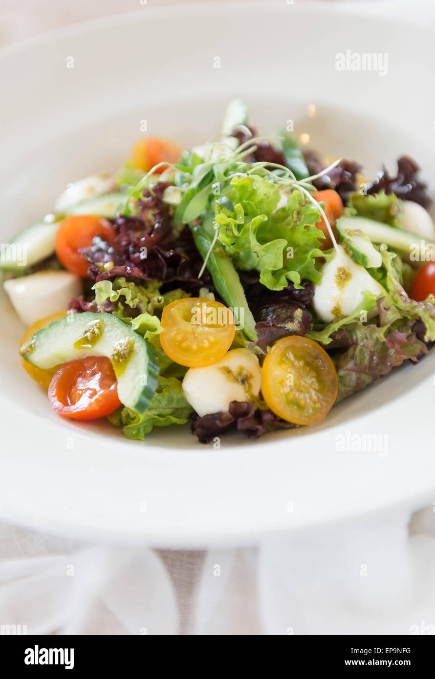 Fresh Tomato And Mozzarella Salad with pesto. Stock Photo