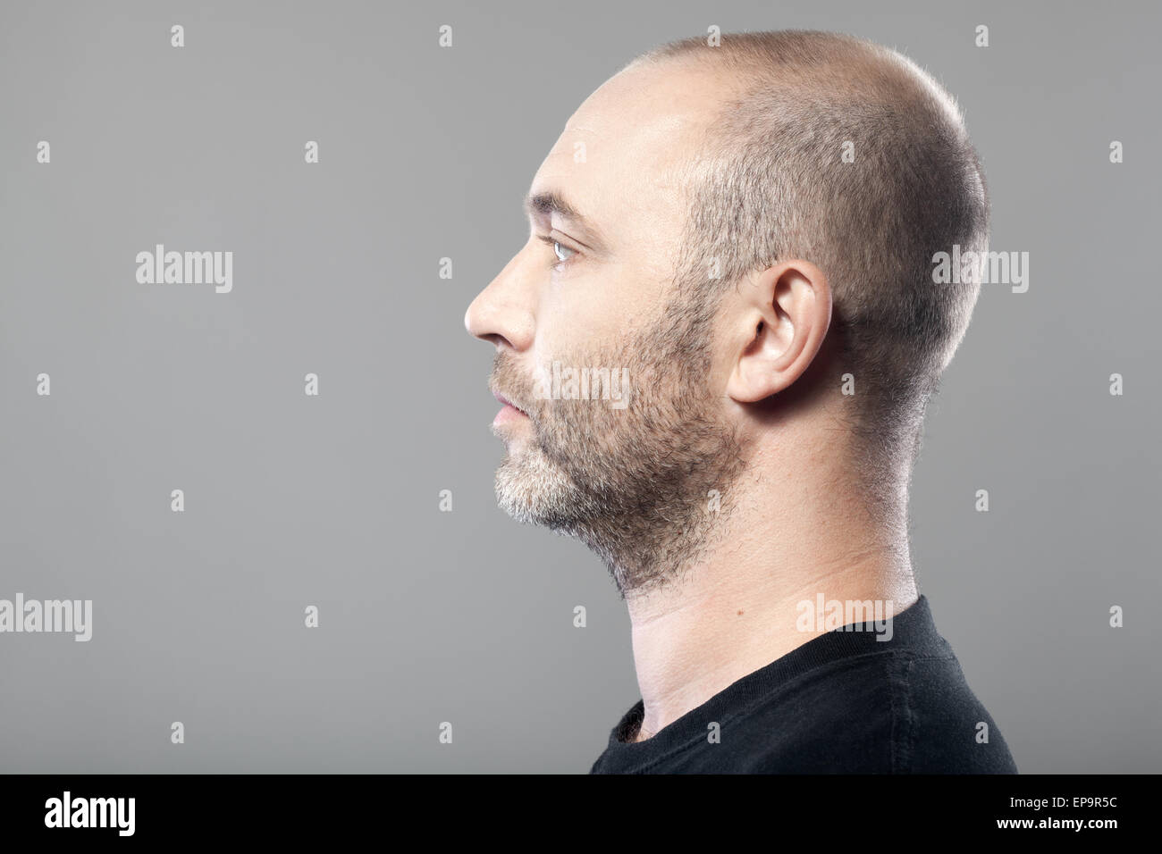profile portrait of man isolated on gray Stock Photo