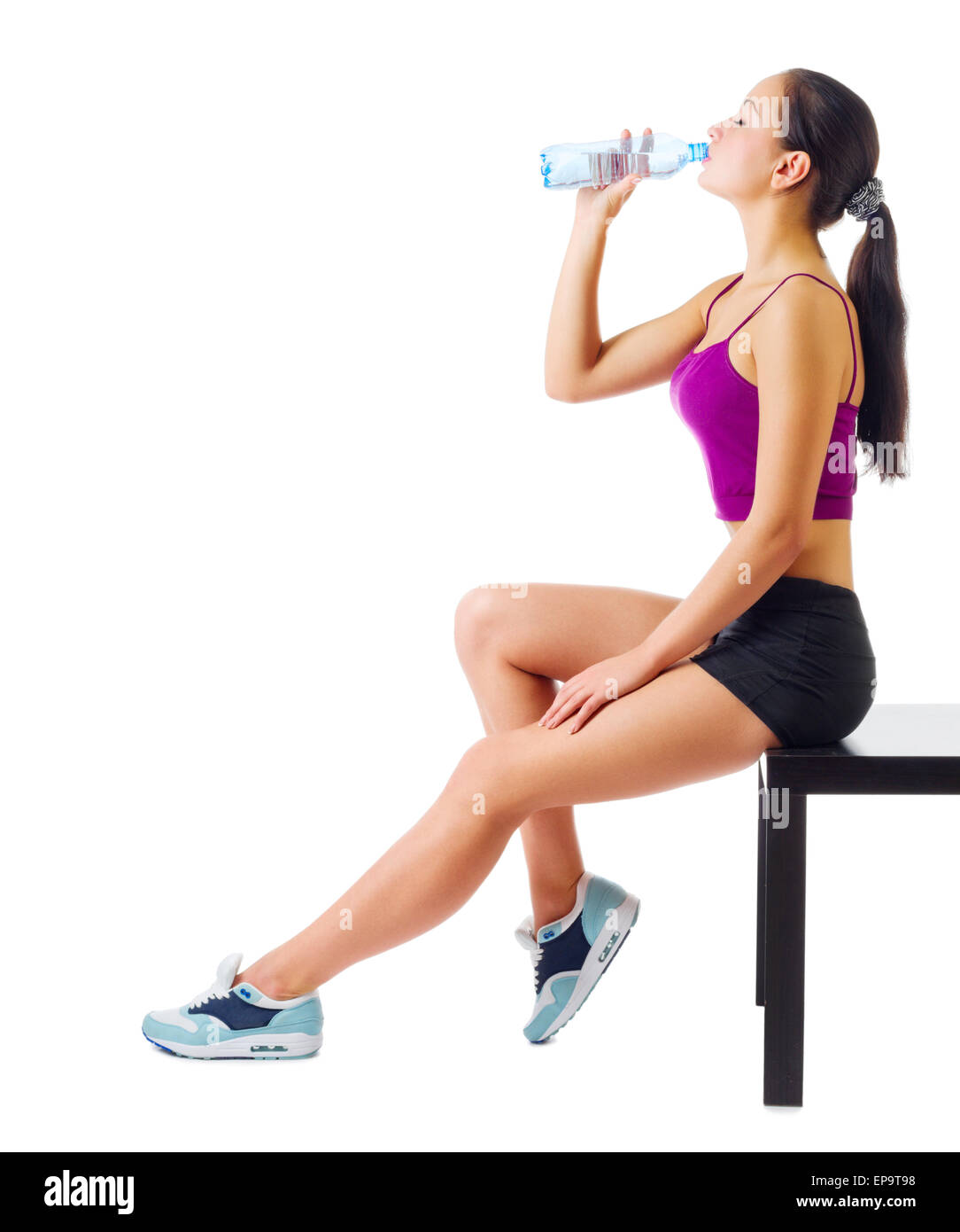Young sporty girl on with water bottle Stock Photo - Alamy