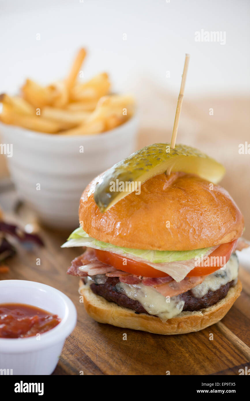 Beef burger and fries served in a bowl. Stock Photo