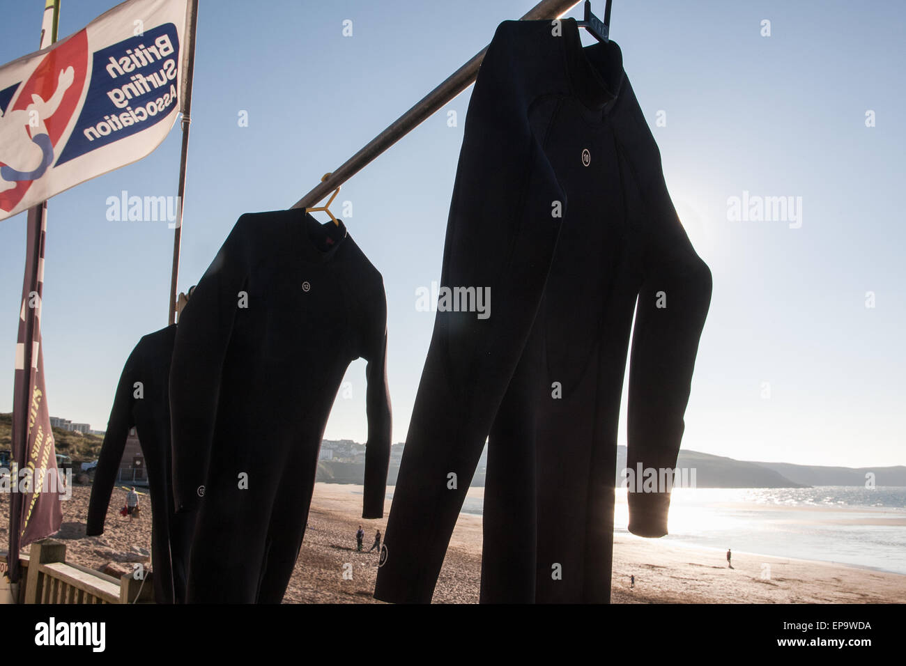 Wetsuits hanging out to dry at Newquay's Fistral Beach, a popular