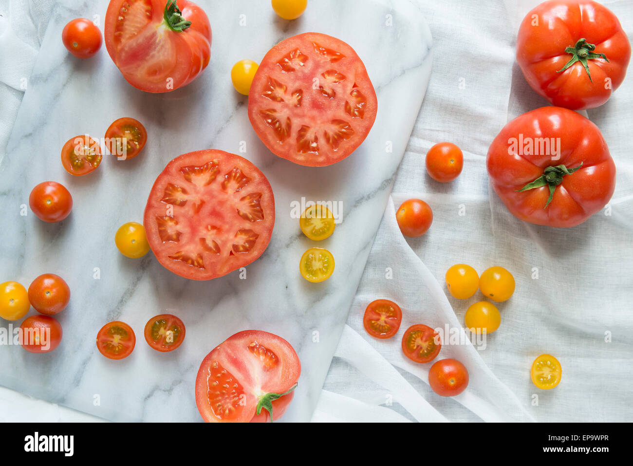 Crop of red and yellow tomatoes Stock Photo - Alamy