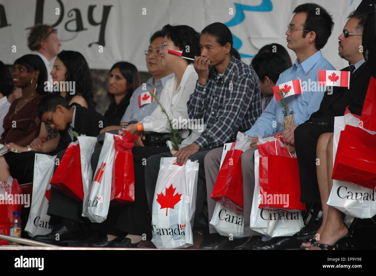 Toronto, Canada immigrants swearing as new Canadian citizen at a