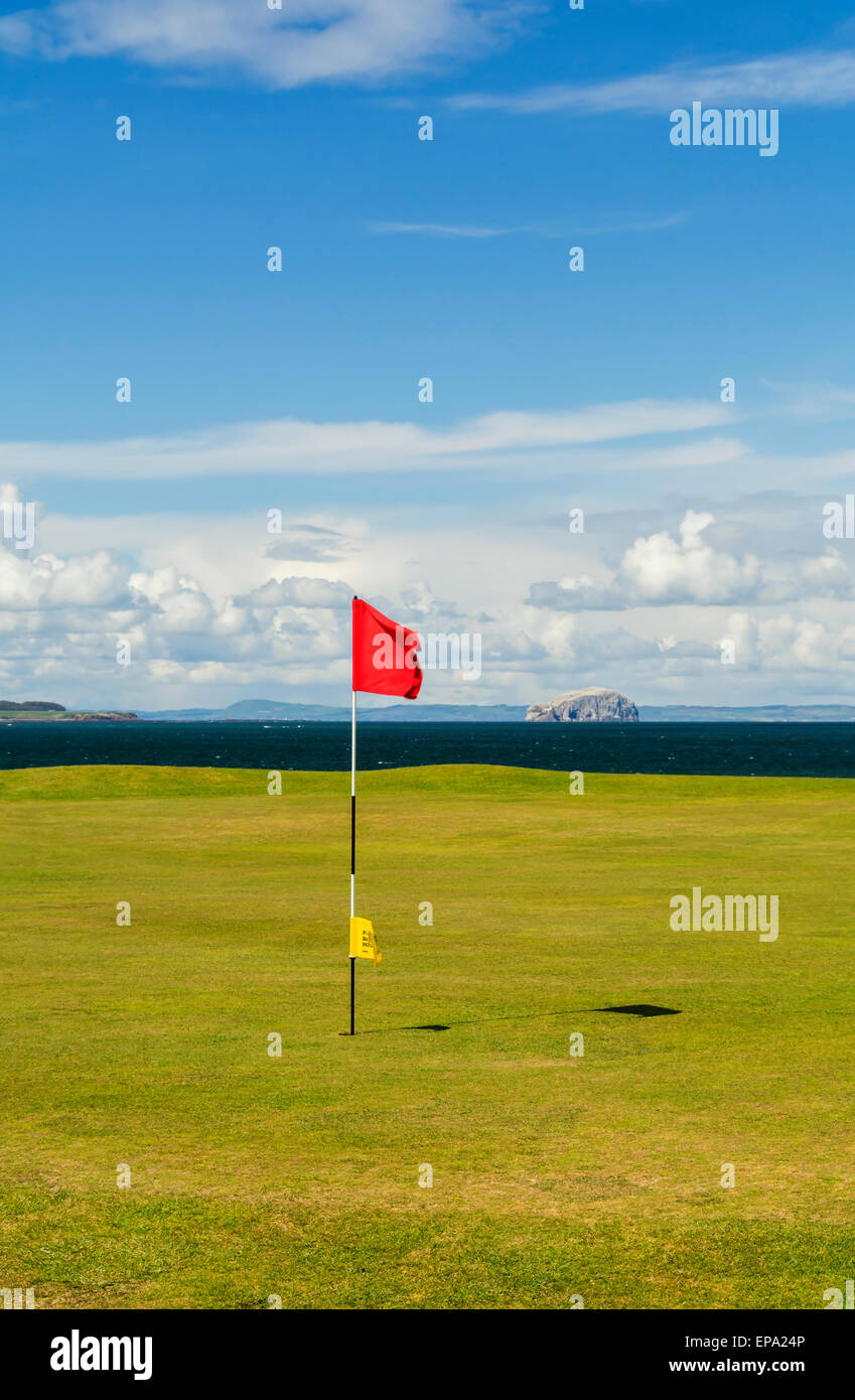 This green on Winterfield Golf Course has a dramatic backdrop of the River Forth and the Bass Rock. Stock Photo