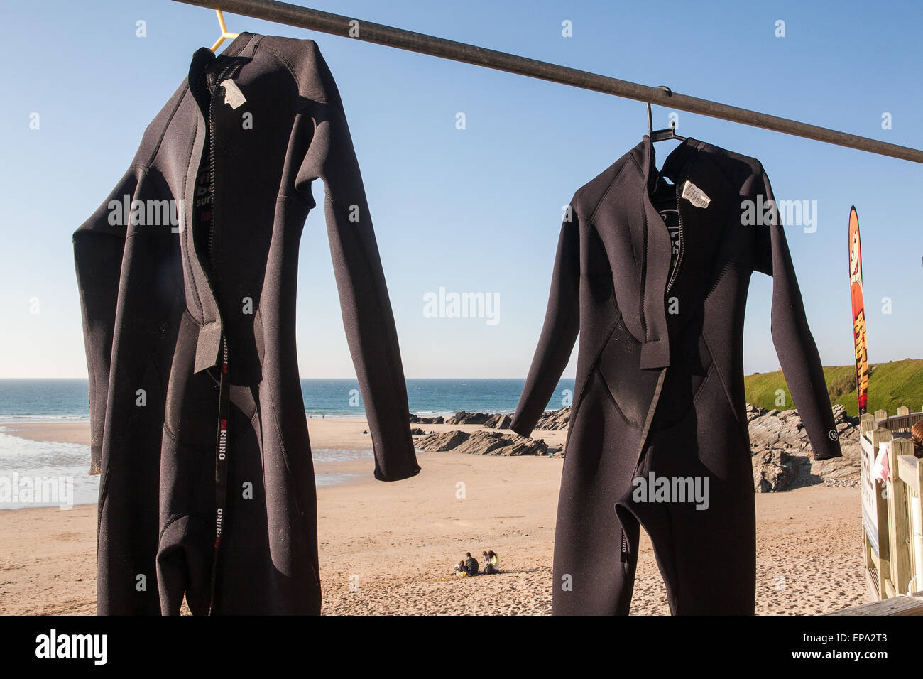 Wetsuits hanging out to dry at Newquay's Fistral Beach, a popular