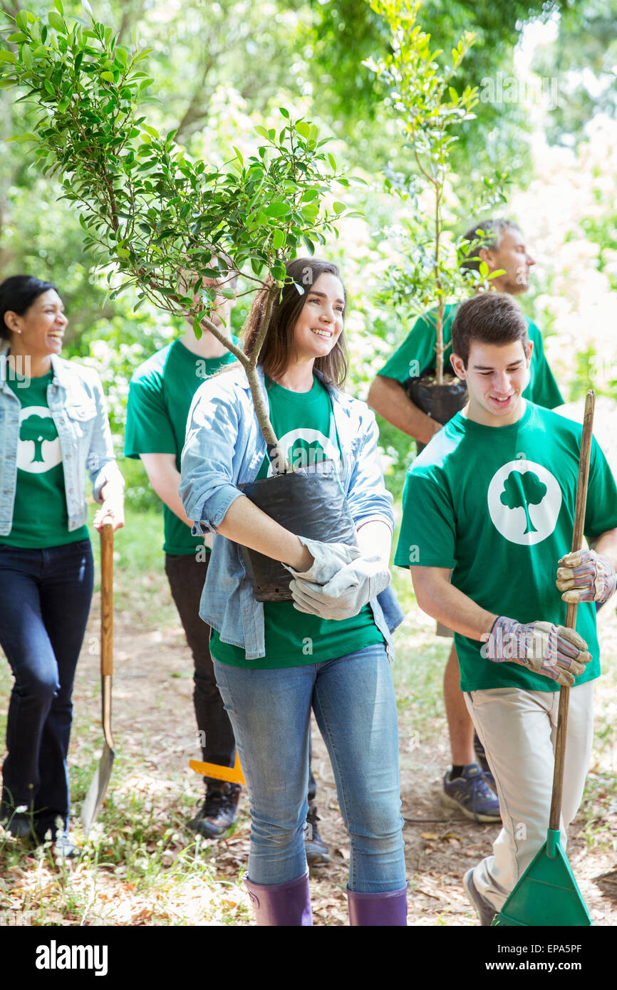 environmentalist volunteering planting tree Stock Photo