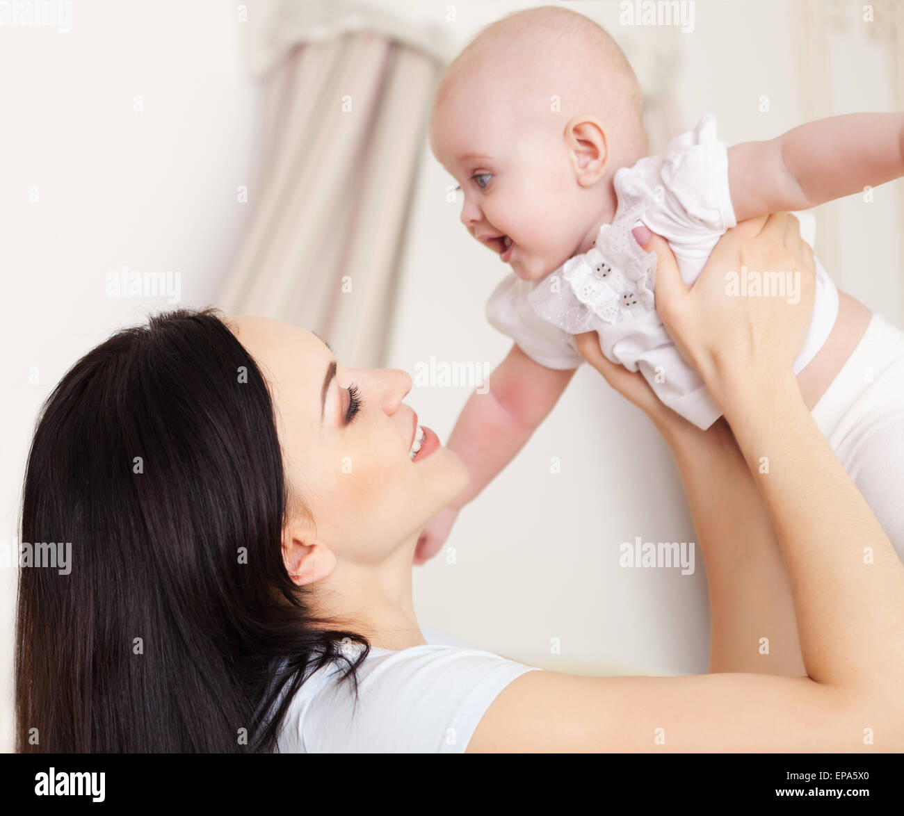 Happy Mother With Six Month Old Baby Girl Indoor Stock Photo Alamy Happy Mother With Six Month Old Baby Girl Indoor Stock Photo Alamy