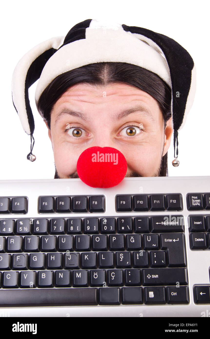 Funny clown with keyboard isolated on white Stock Photo Alamy