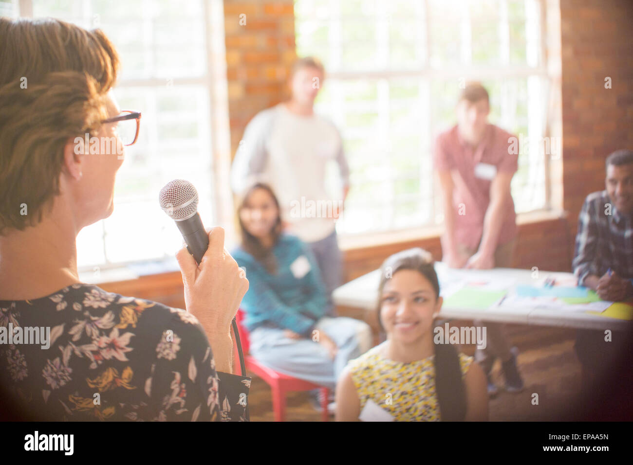 audience listening speaker community center Stock Photo Alamy