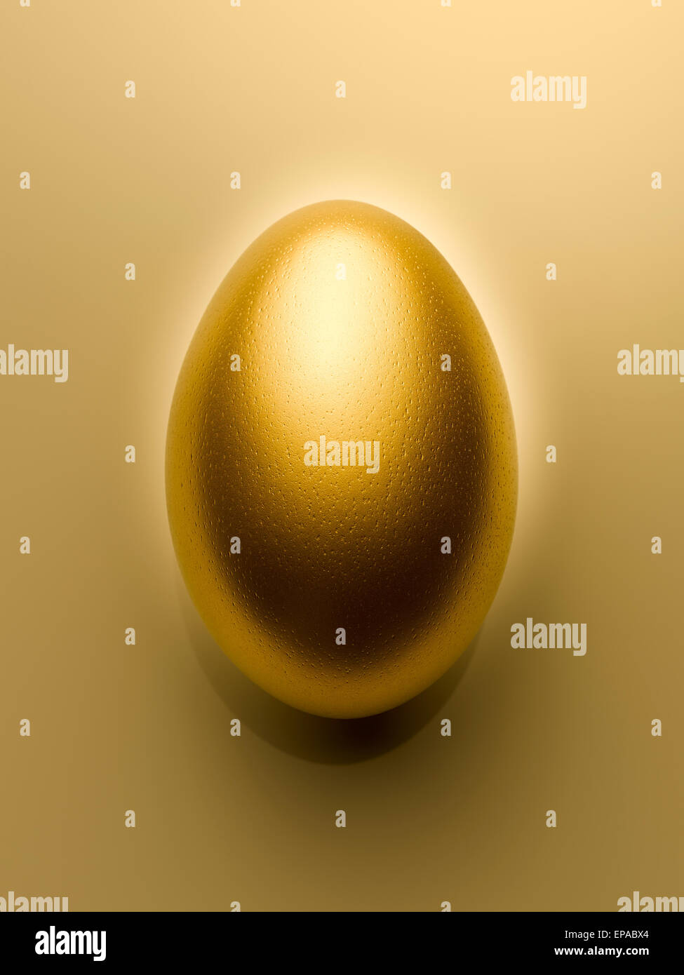 directly above golden egg gold still life Stock Photo