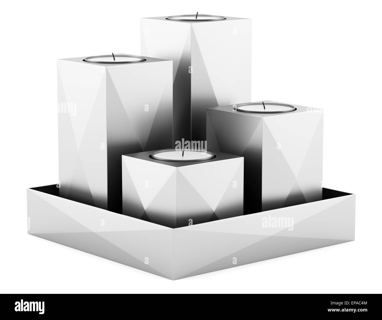 four metallic candlesticks with candles isolated Stock Photo Alamy